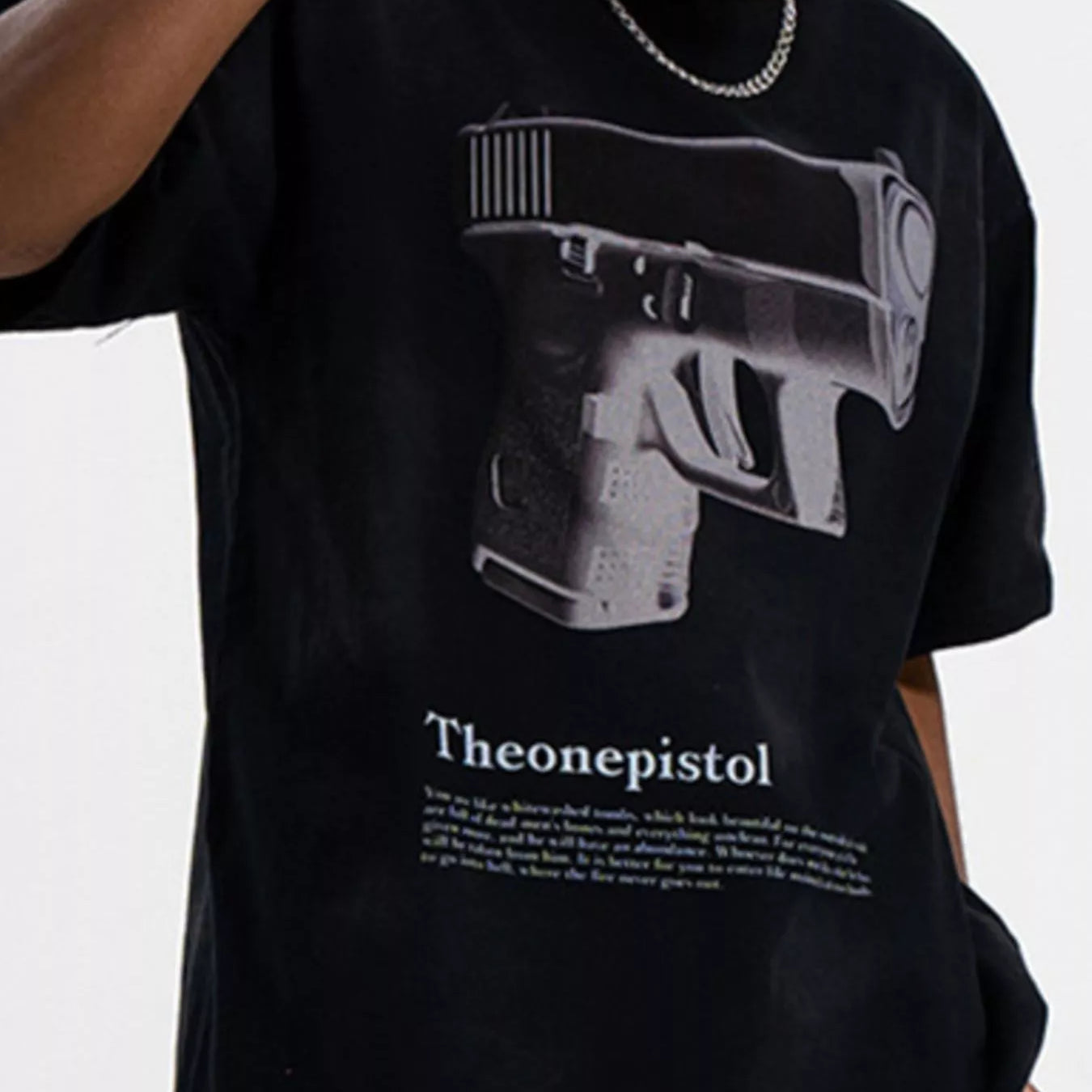 Men's Graphic Round Neck Oversized T-Shirt featuring a bold gun design in black and white.