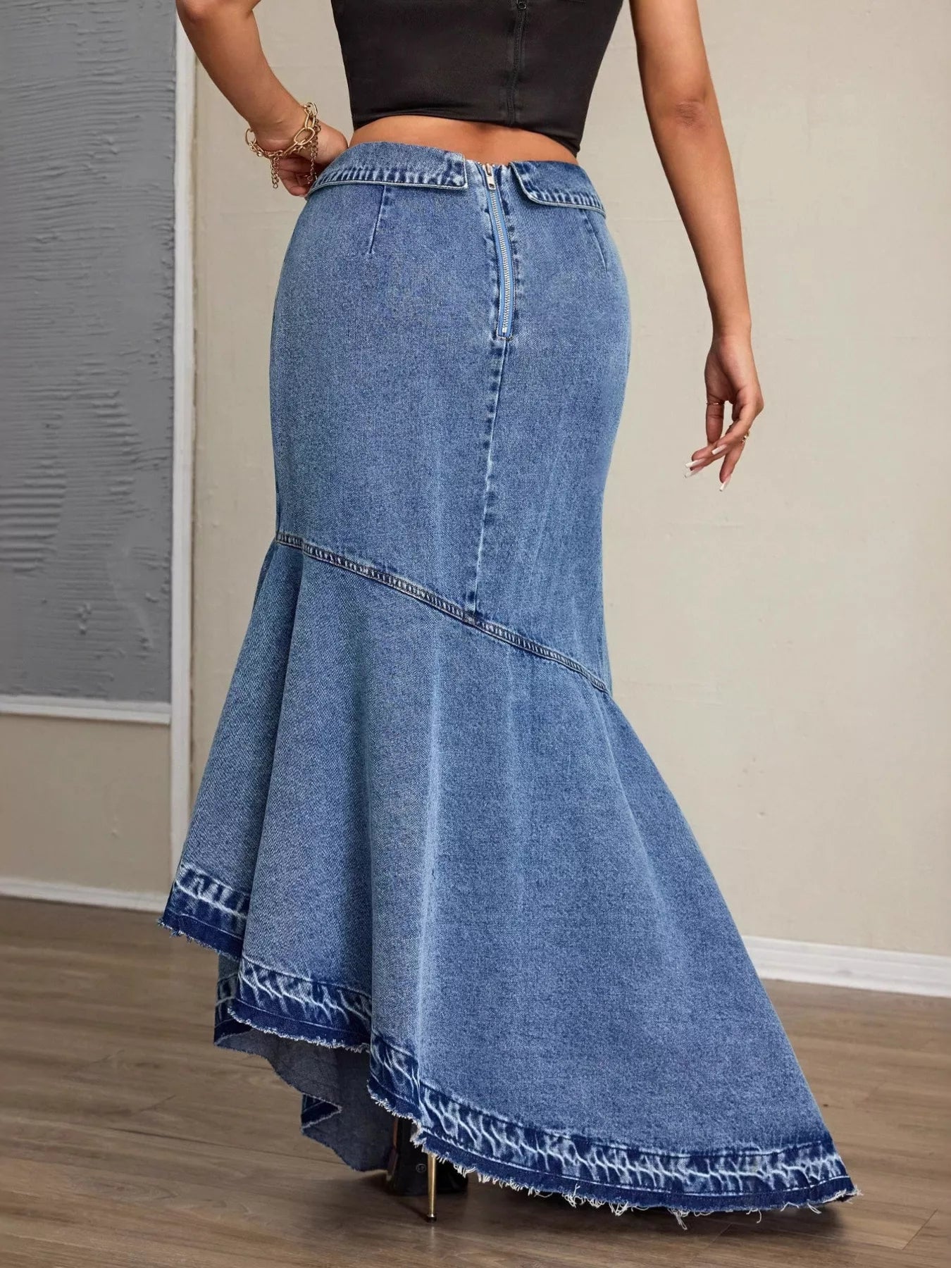 High-Waist Asymmetrical Slit Denim Maxi Mermaid Skirt showcasing the back design and flared hemline.