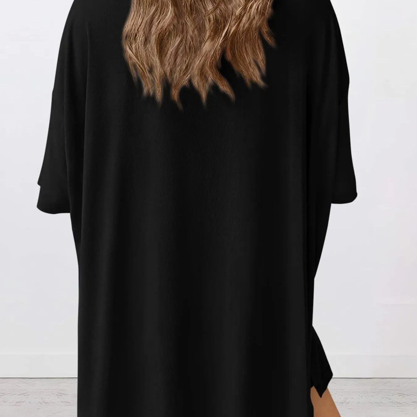 Full Size Oversized Slit Round Neck Top and Shorts Lounge Set Plus Size shown from the back in black.