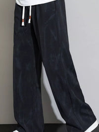 Men's Loose Fit Casual Pants featuring drawstring and side pockets in a relaxed style.