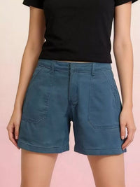 Stylish Pocketed Denim Shorts in blue with front pockets and a button closure, perfect for summer wear.