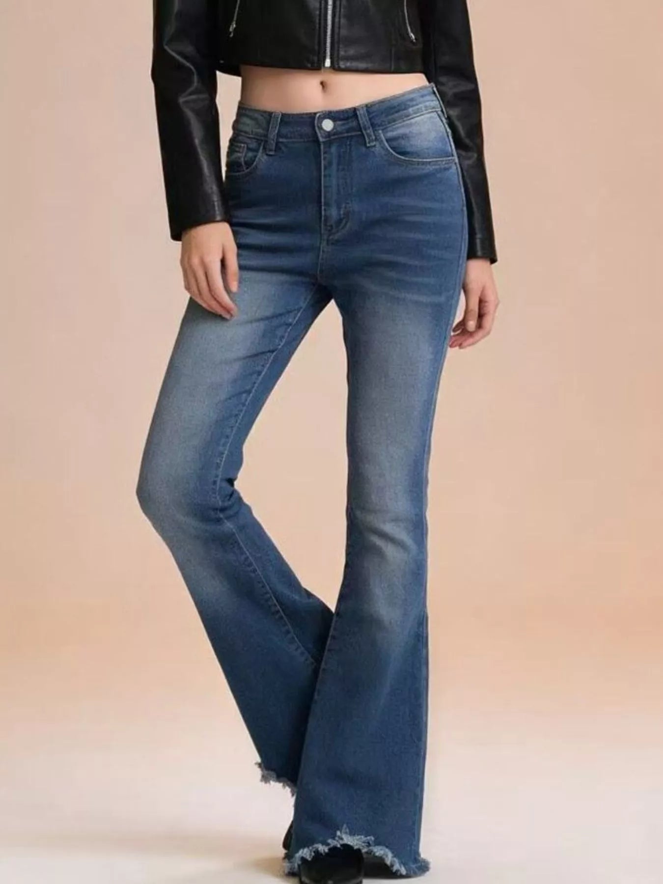 Raw Hem High-Waisted Flare Jeans displayed on a model in a stylish outfit featuring a leather jacket.