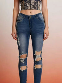 Distressed High Waist Jeans featuring moderate stretch and stylish ripped details for a trendy look.