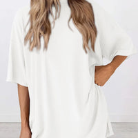 Full Size Oversized Slit Round Neck Top and Shorts Lounge Set Plus Size model wearing a white oversized top.