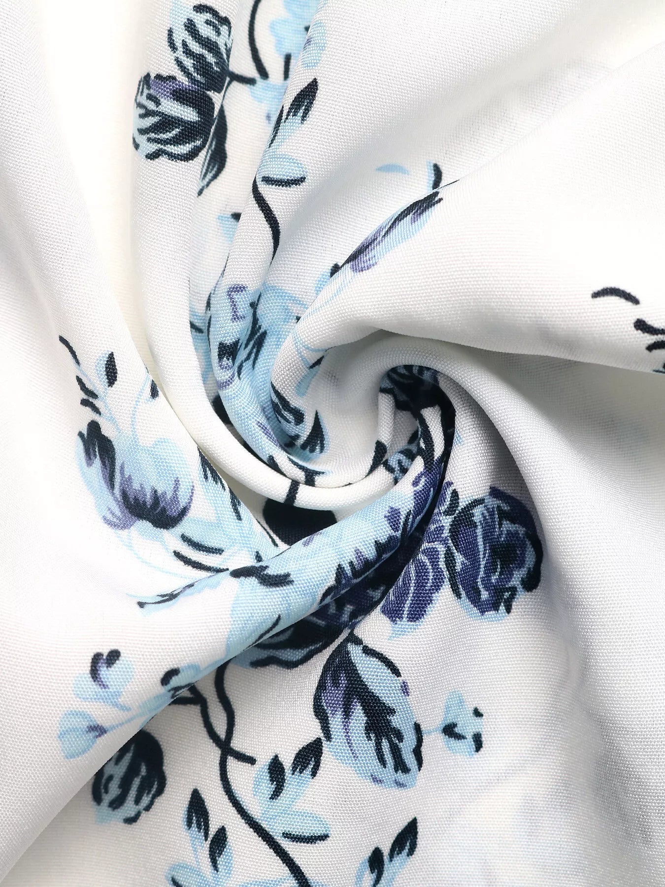 Floral Print Tie Front Wide Leg Pants fabric detail showcasing blue floral design on white background.