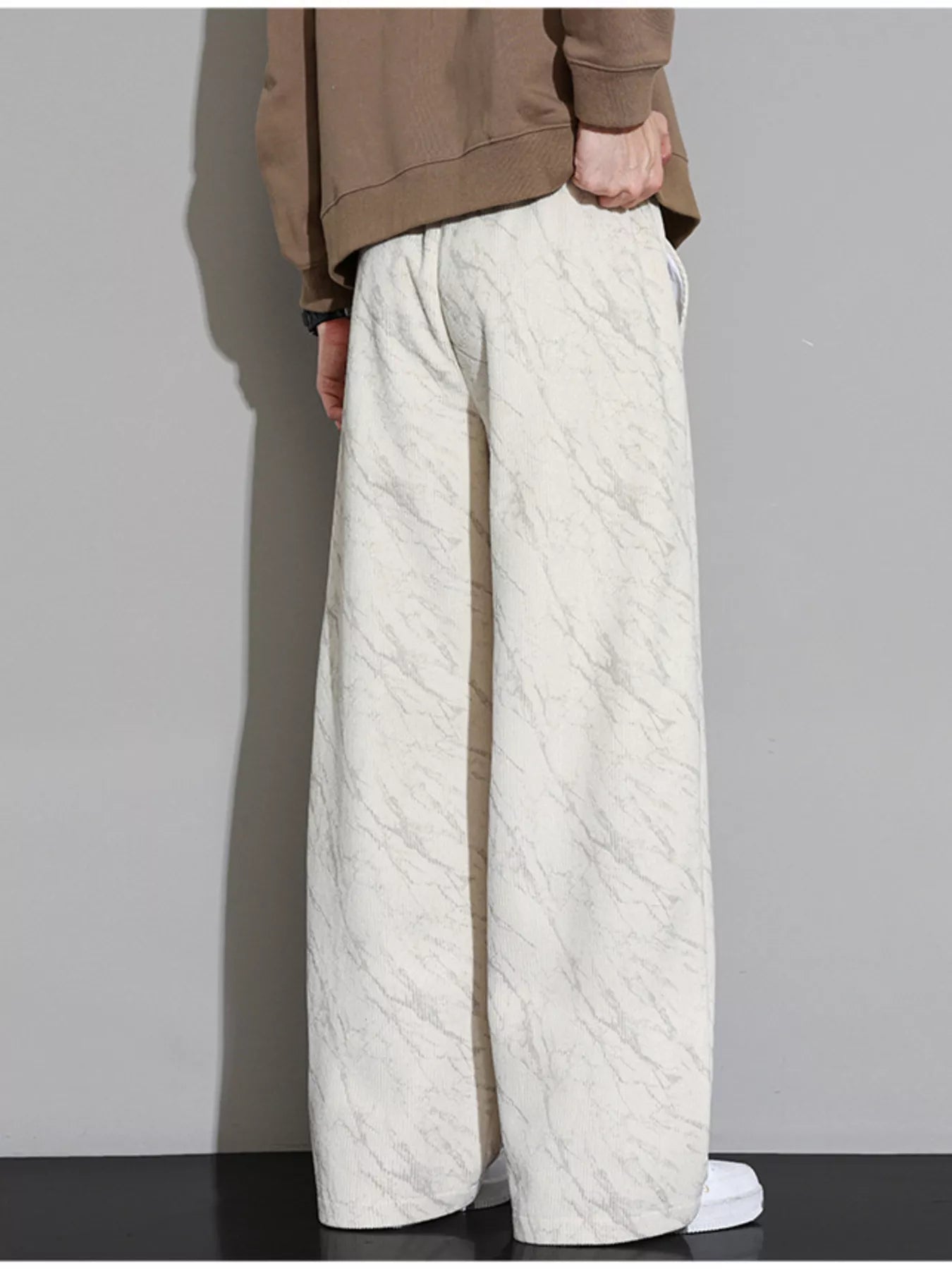 Men's Wide Leg Casual Pants in marble print design, showcasing a comfortable fit and stylish look from the back.