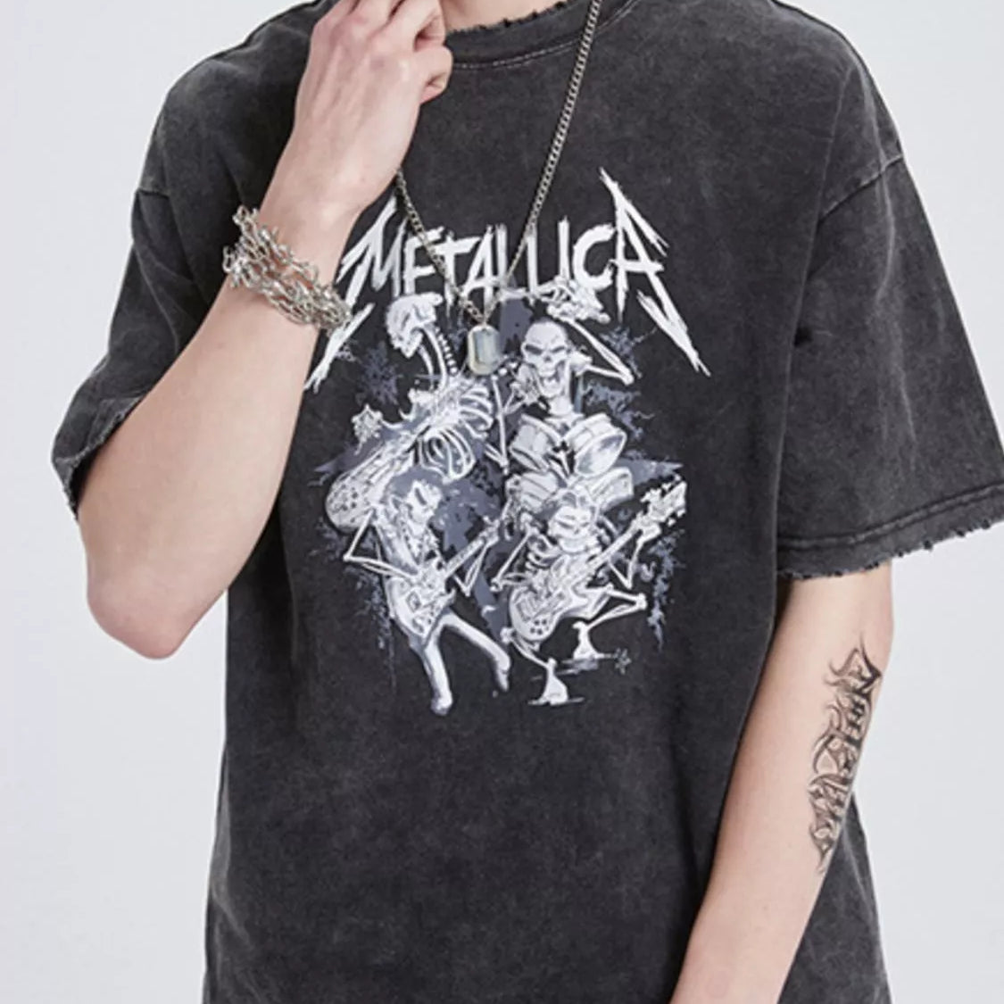 Men's Graphic METALLICA Round Neck Wash T-Shirt, featuring unique graphic design on a vintage-style fabric.