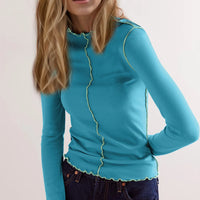 Basic Bae Contrast Trim Mock Neck Long Sleeve T-Shirt displayed on a model in vibrant blue with contrasting trim.
