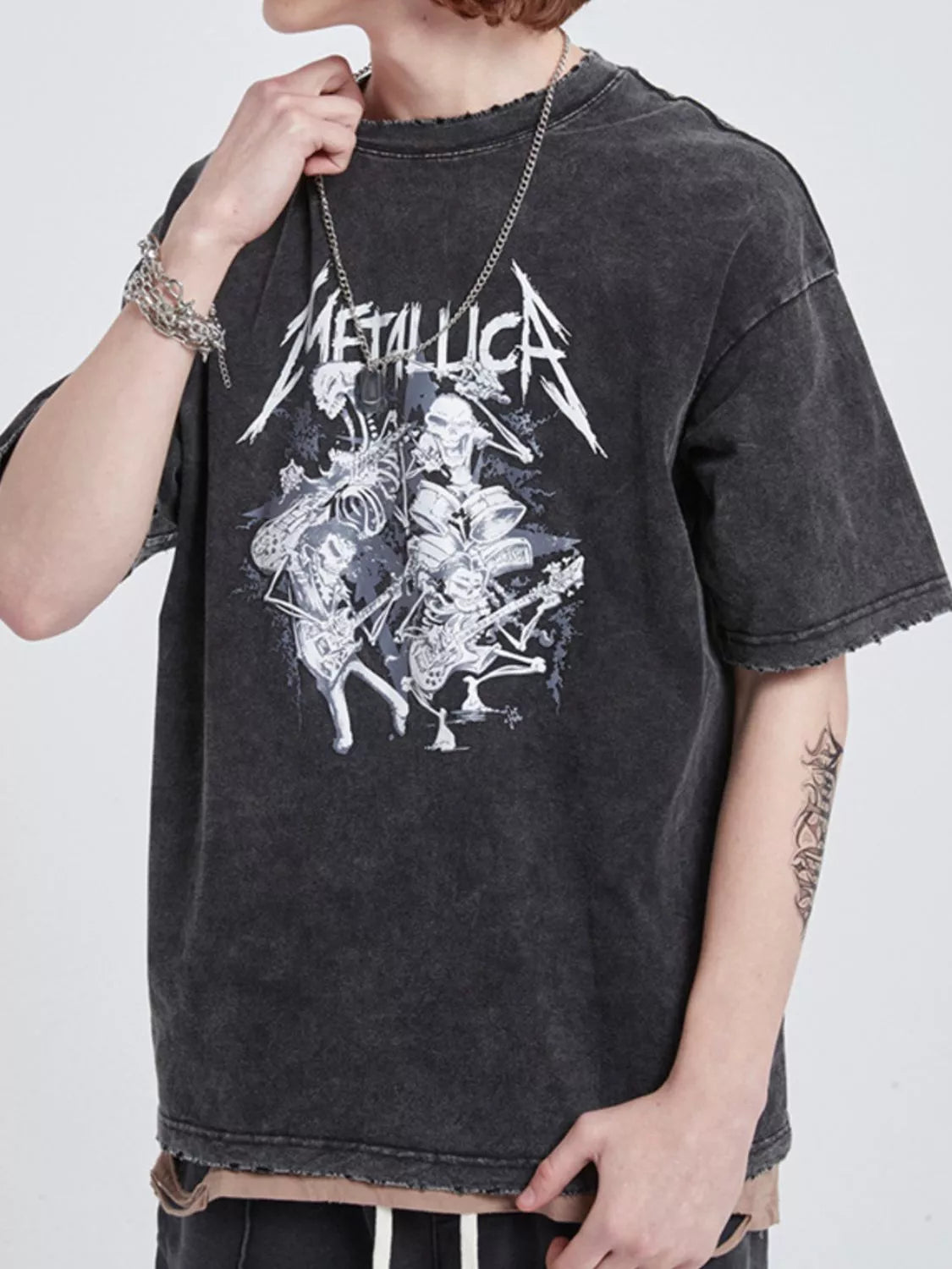 Men's Graphic METALLICA Round Neck Wash T-Shirt featuring a vintage-inspired design and relaxed fit.