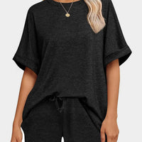 Round Neck T-Shirt and Drawstring Shorts Set in black with loose fit and casual style.