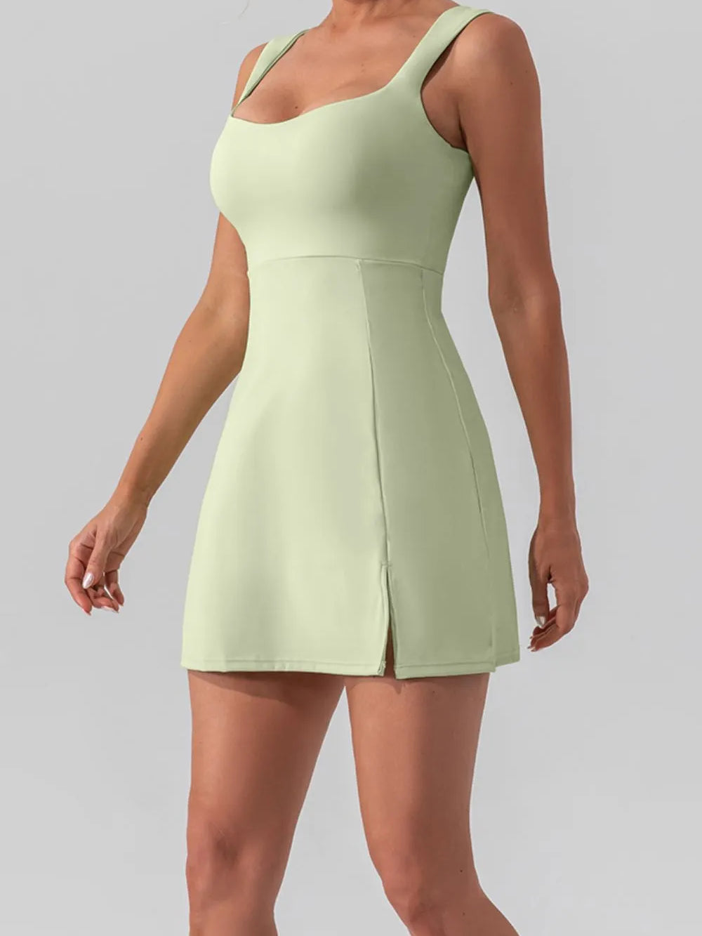Square Neck Sleeveless Slit Mini Active Dress in light green with side slit and modern square neckline.