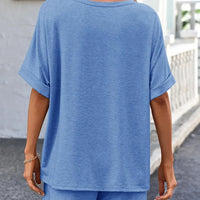 Back view of a woman wearing a Round Neck T-Shirt and Drawstring Shorts Set in blue.