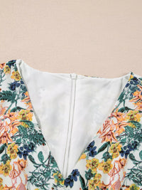 Floral Print Ruffle Hem Mini Dress back view showcasing the zipper and floral design.