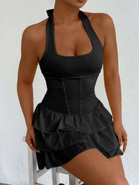 Black halter neck ruffle layered mini dress with tiered skirt and strappy back