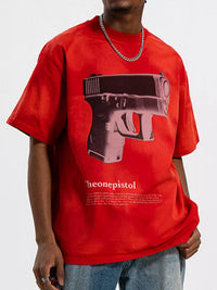 Men's Graphic Round Neck Oversized T-Shirt featuring a bold gun graphic on a red background.