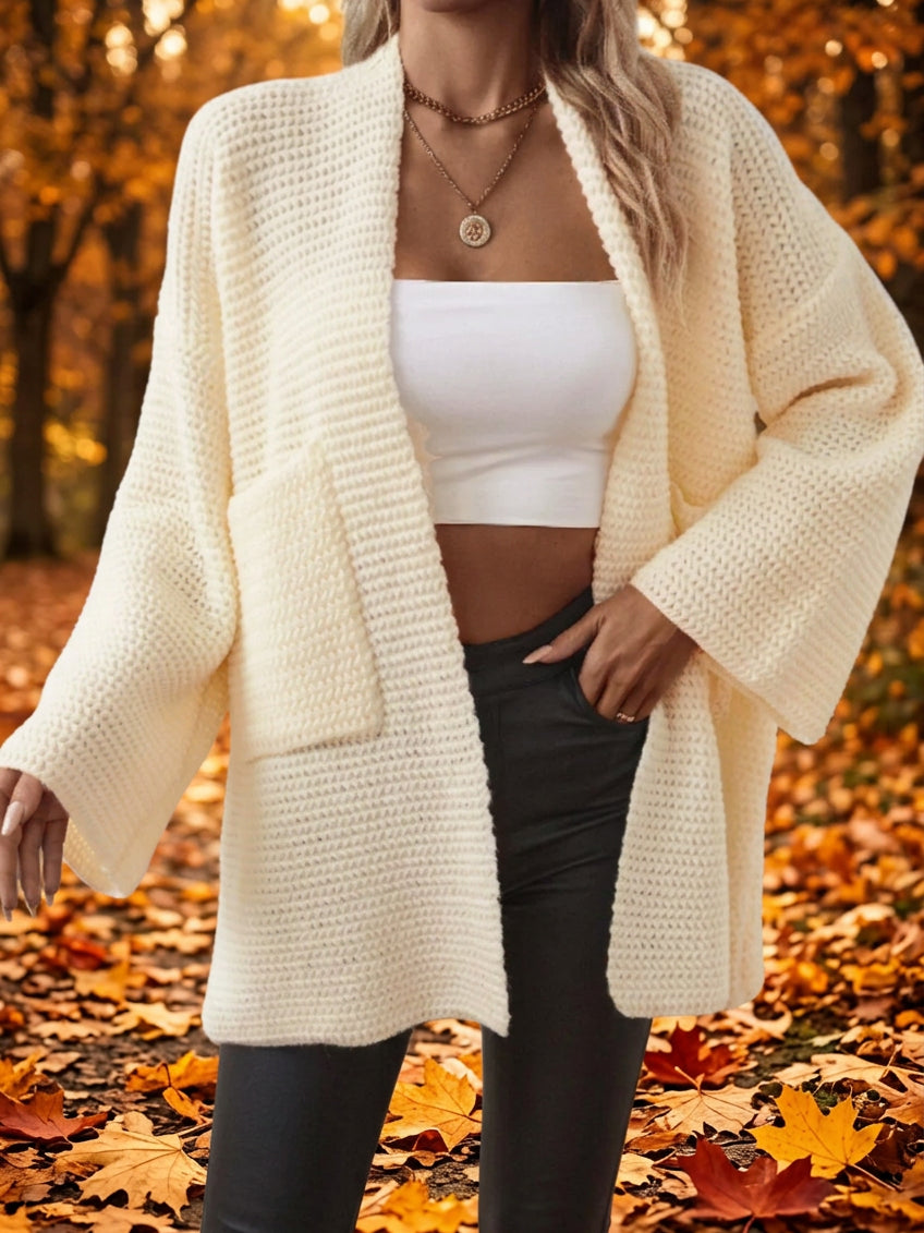 Ivory open-front knit cardigan with long sleeves and textured chunky stitch