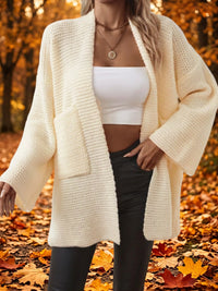 Ivory open-front knit cardigan with long sleeves and textured chunky stitch