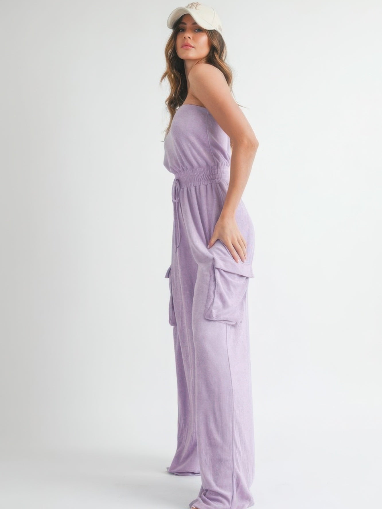 Model wearing a Tube Top Jumpsuit Romper in purple, showcasing its stylish design and comfortable fit.