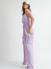 Model wearing a Tube Top Jumpsuit Romper in purple, showcasing its stylish design and comfortable fit.