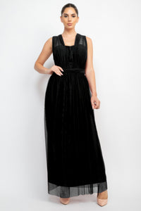 Black A-line maxi dress with sleeveless mesh overlay and gathered waist