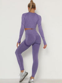 Seamless leggings set in purple featuring a crop top and high-waisted leggings with a stylish back view.