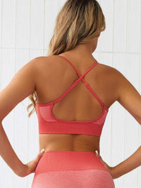 Back view of a seamless activewear two piece set showcasing a stylish cross-back crop tank top.