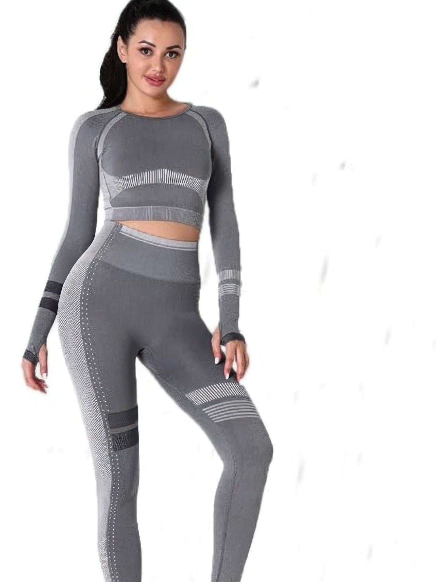 Seamless yoga set with long sleeve crop top and high-waisted leggings in gray for workouts and comfort.