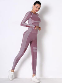 Model wearing a seamless long sleeve yoga set in mauve, showcasing the fitted long sleeve crop top and high-waisted leggings.
