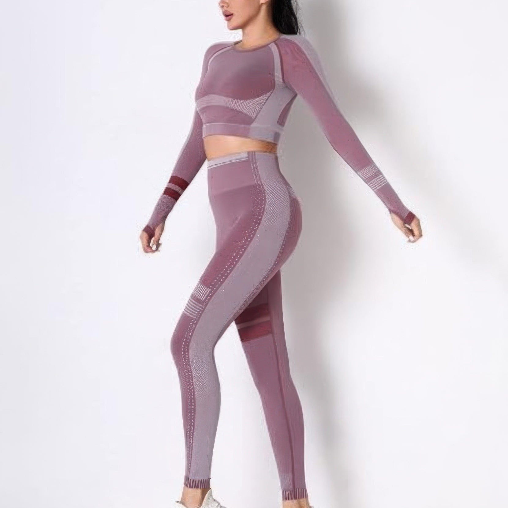 Seamless long sleeve yoga set featuring a fitted crop top and high-waisted leggings in stylish pink hues.