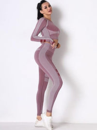 Seamless long sleeve yoga set in a stylish pink design, perfect for workouts and casual wear.