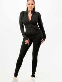Activewear jacket and legging set featuring a sleek zip-front design, perfect for workouts and casual wear.