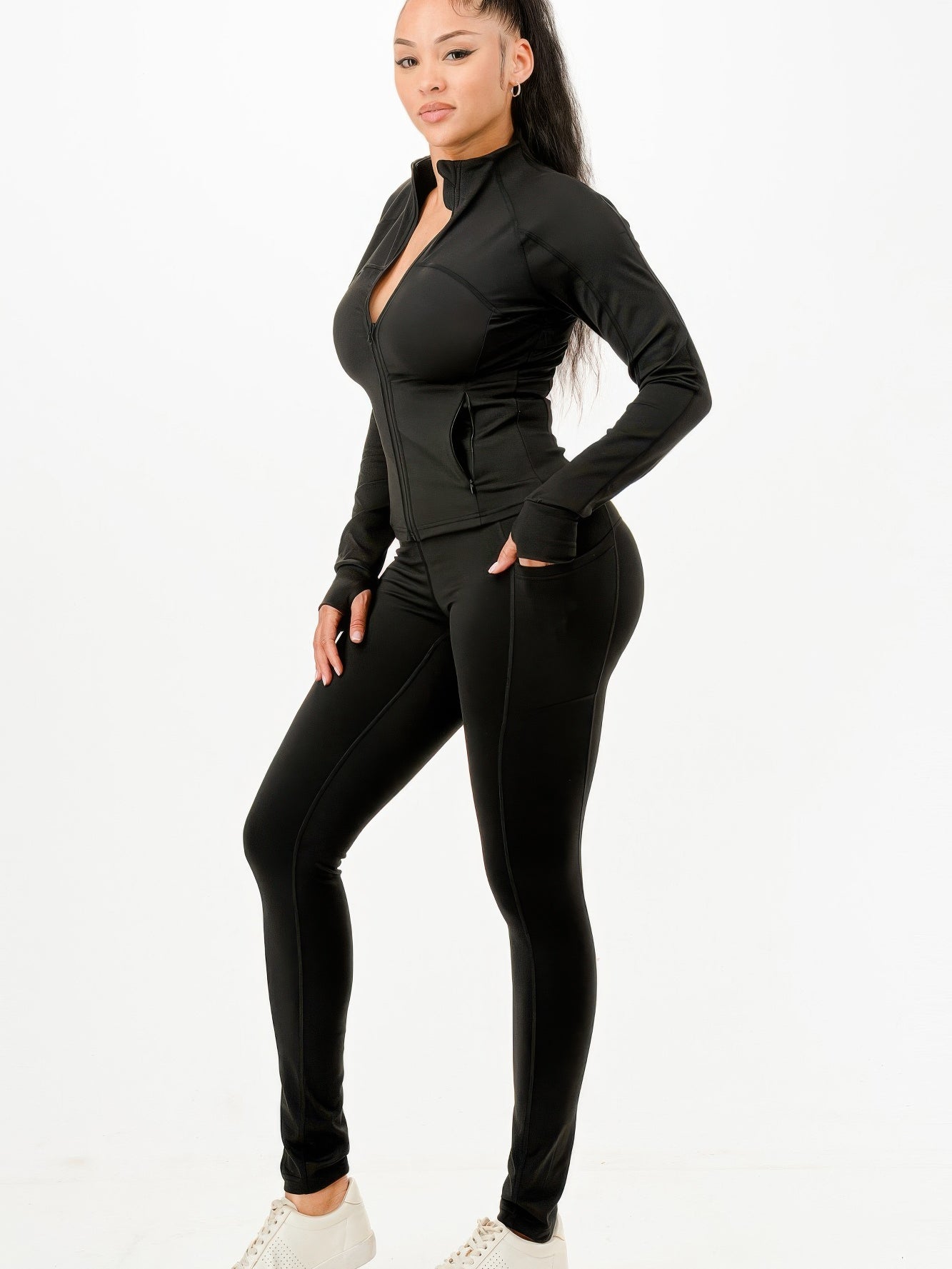 Activewear jacket and legging set featuring a sleek zip-front jacket and form-fitting leggings, ideal for workouts and casual wear.