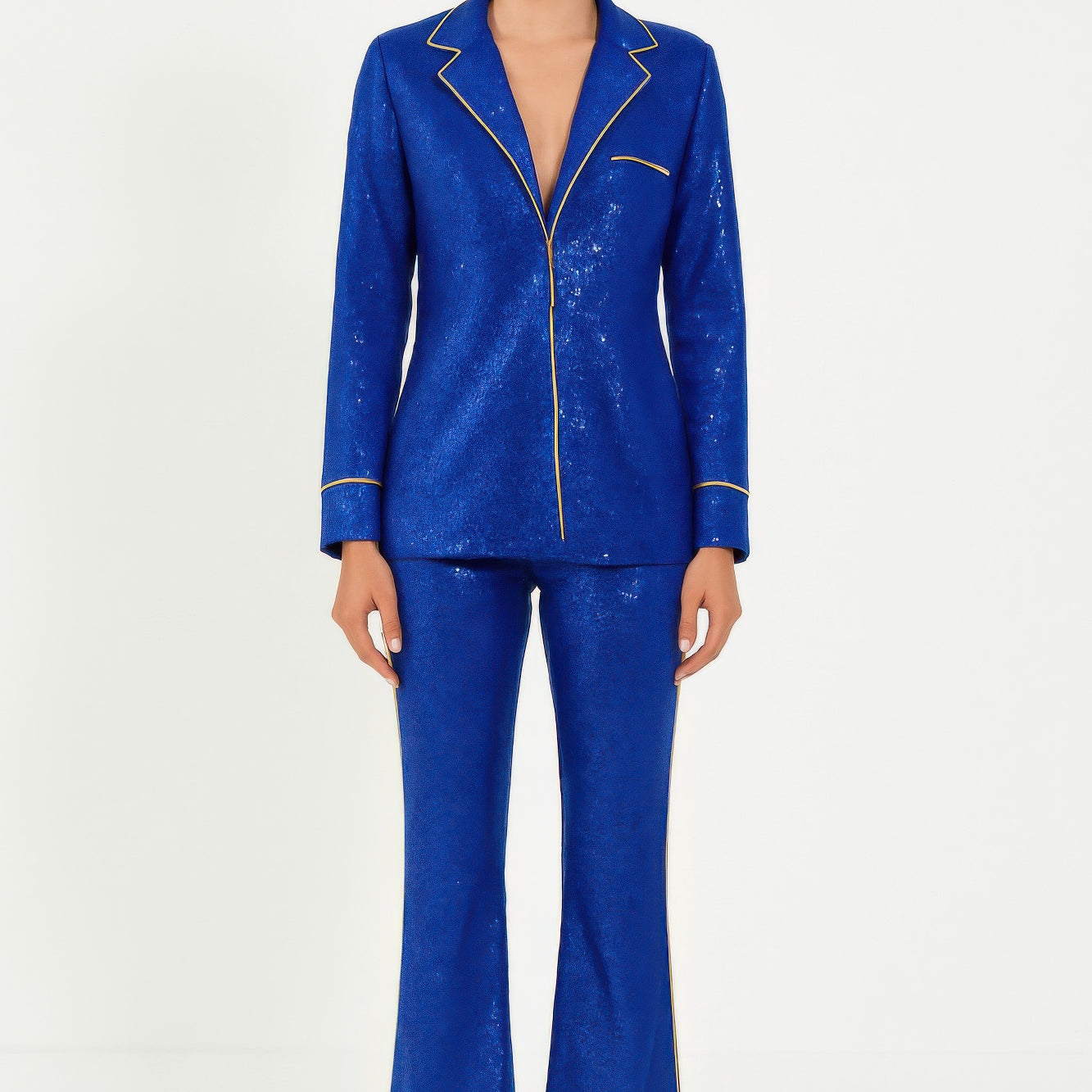 Woman's Resort Wear Pant Set in blue sequined fabric, featuring a collared top and flared pants for a stylish look.