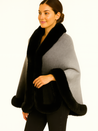 Ombre Faux Fur Trim Cape Wrap showcasing soft ombré grey with plush black fur trim, perfect for elegant layering.