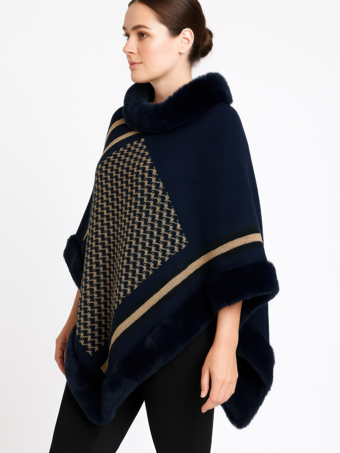 Patterned Knit Poncho With Faux Fur Trim displayed on a model, featuring geometric patterns and fur trim.