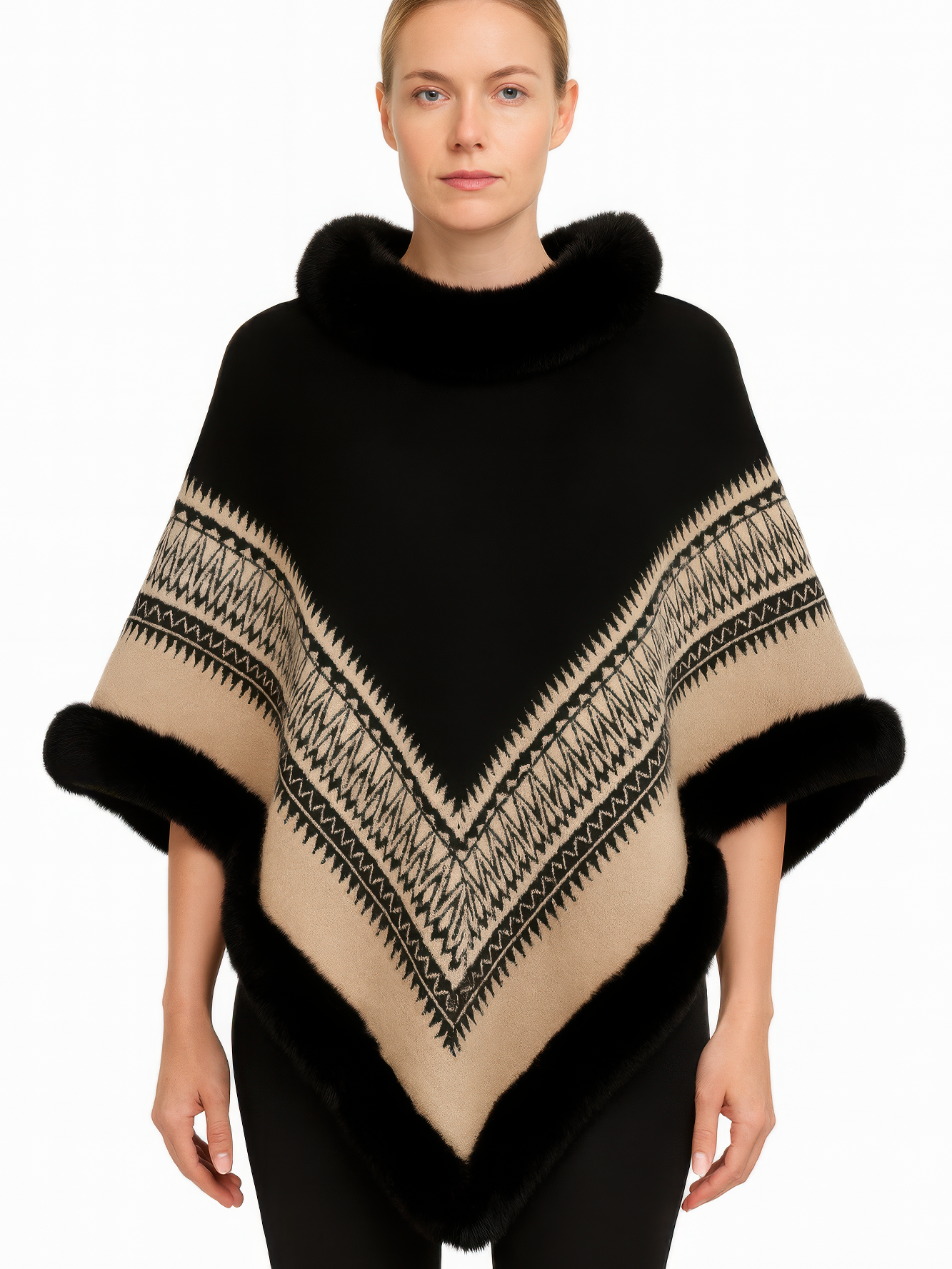 Chevron Trim Poncho With Faux Fur Collar worn by a model, featuring a black knit and camel chevron design.