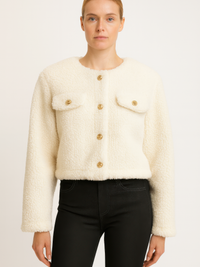 Faux Shearling Button-Front Cropped Jacket in cream with gold buttons and front pockets, styled with black jeans.