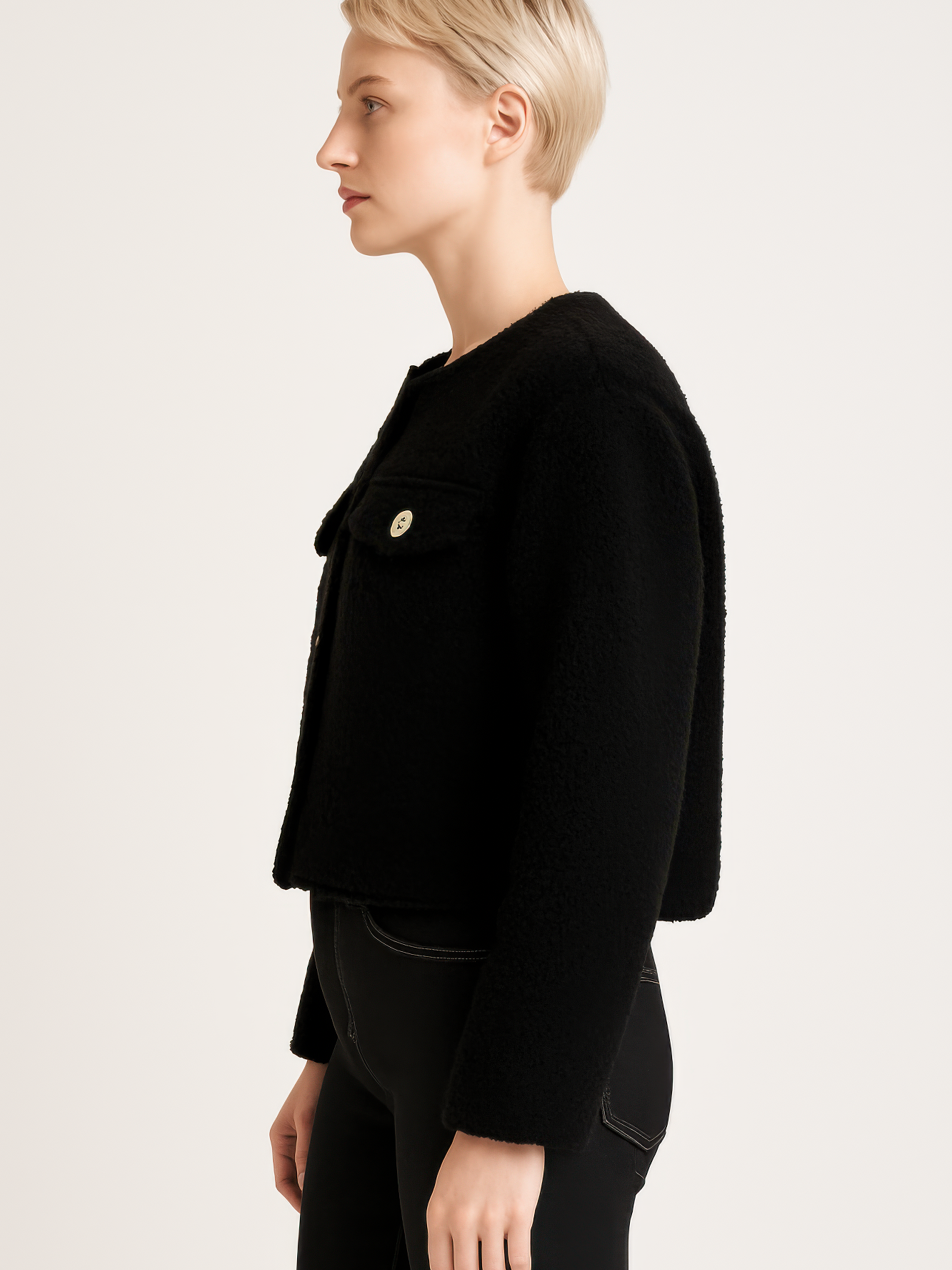 Faux Shearling Button-Front Cropped Jacket displayed on a model, showcasing its stylish cropped design and soft fabric.