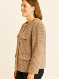 Textured Woven Button-Front Jacket in soft quilted fabric and neutral tone, featuring button details and side pockets.