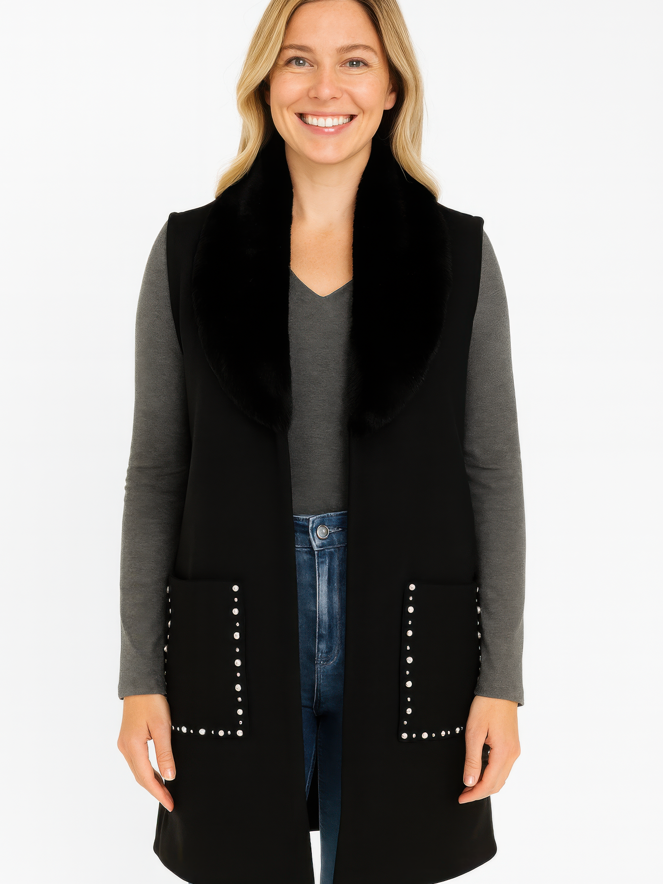 Sleeveless Wool-Blend Vest With Faux Fur Collar worn by a smiling woman, featuring a stylish open-front design and decorative studs.