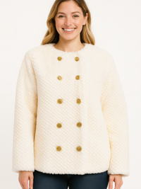 Textured Double-Breasted Faux Shearling Jacket with plush ivory fabric and gold buttons.