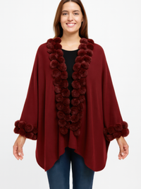Open-Front Cape With Pom Faux Fur Trim in burgundy with plush pom trim, perfect for stylish fall layering.