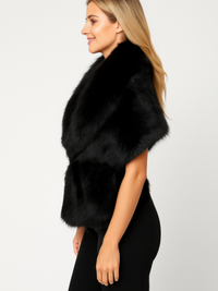 Black faux fur sleeveless vest with cinched waist, side view