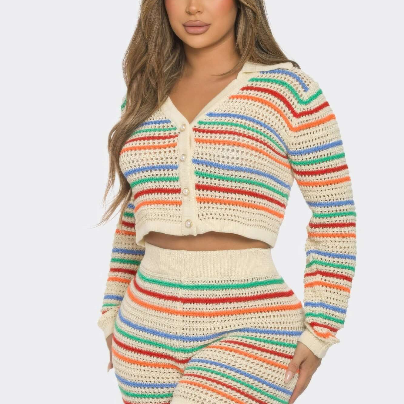 Model wearing a Striped Knit Set featuring a long sleeve collared top and matching shorts in vibrant colors.