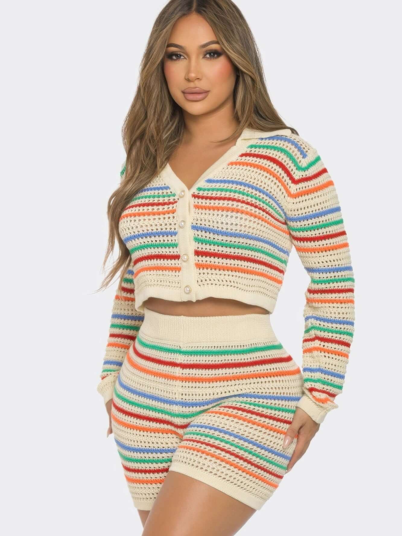 Model wearing a Striped Knit Set featuring a long sleeve collared top and matching shorts in vibrant colors.