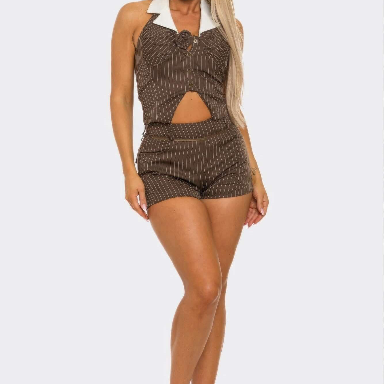 Collared Vest Pleated Skort Set featuring a stylish collar and cut-out detail in a fitted design.