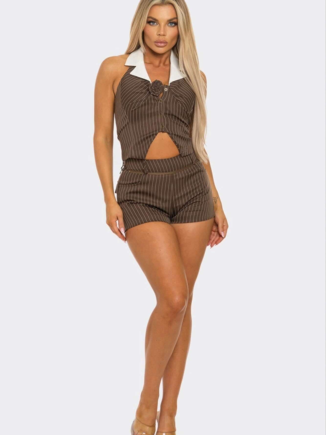Collared Vest Pleated Skort Set featuring a stylish collar and cut-out detail in a fitted design.