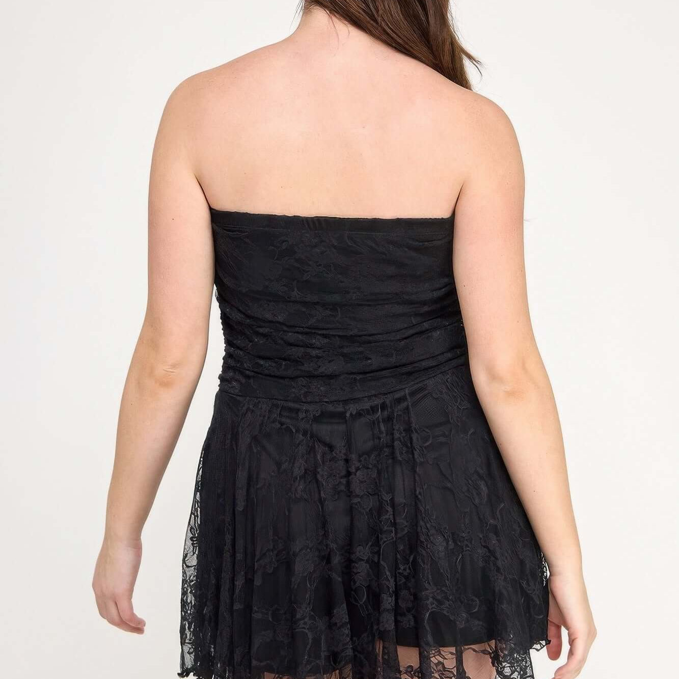 Back view of Plus Size Ots Lace Overlay Assym Dress showcasing the lace design and asymmetrical hem.
