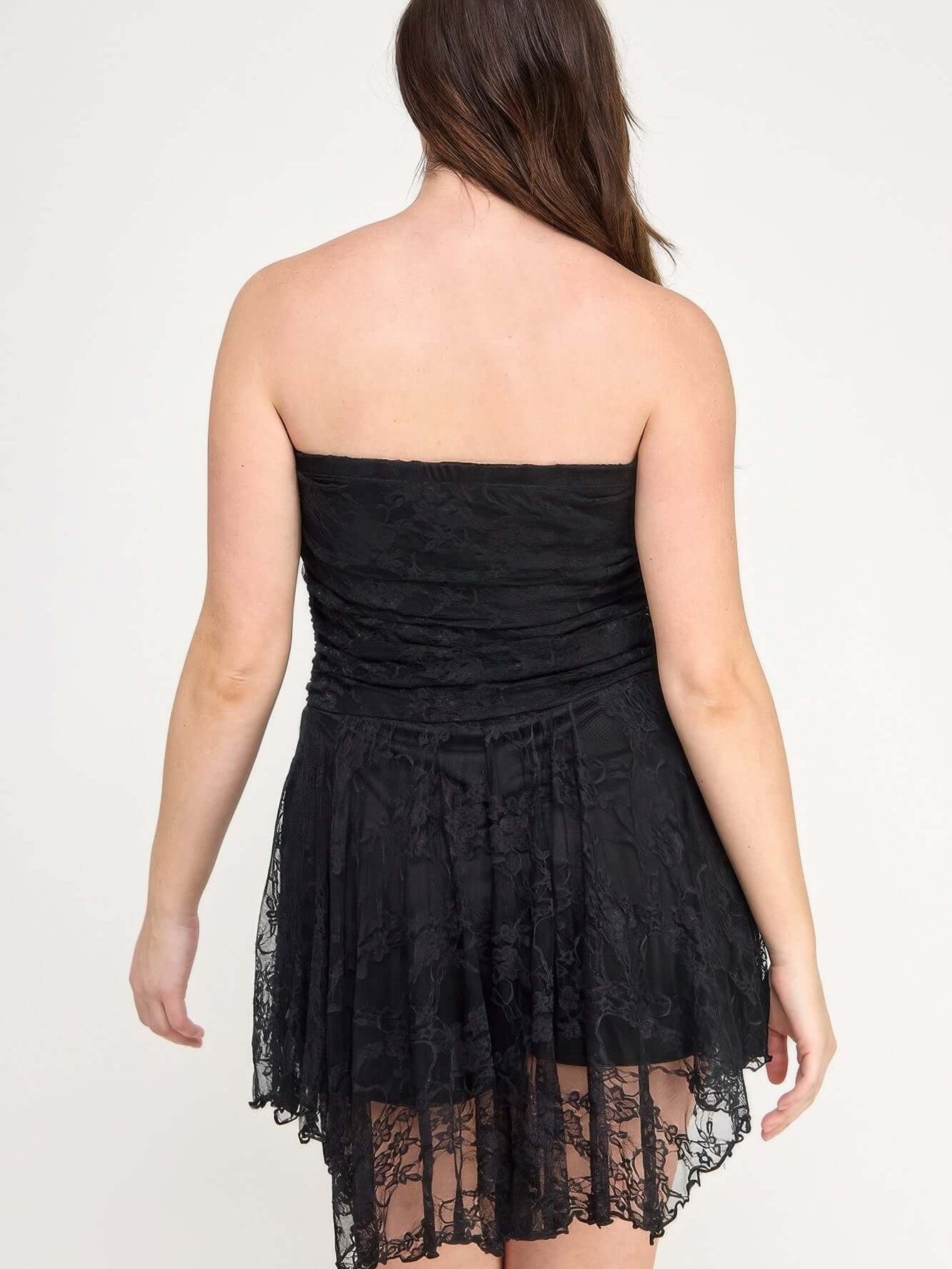 Back view of Plus Size Ots Lace Overlay Assym Dress showcasing the lace design and asymmetrical hem.