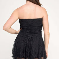 Back view of Plus Size Ots Lace Overlay Assym Dress showcasing the lace detailing and asymmetrical hem.